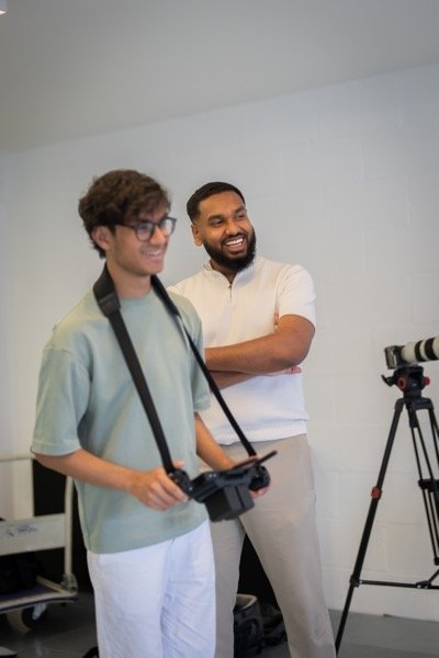 White Box Media production team laughing during studio shoot
